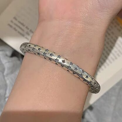 Extendable Silver with Black Star Bangle - Image 3