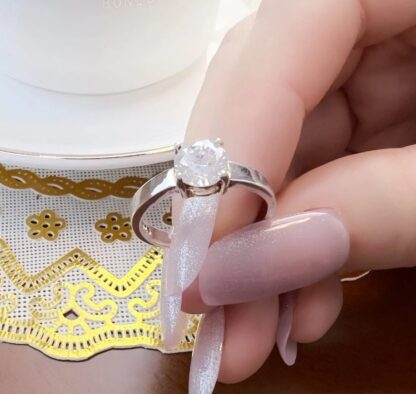 Exquisite Silver "Wedding" Ring with Shimmering White Diamond-Like Stone - Image 4