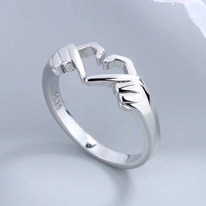Silver Romantic Love Hand with Heart-Shaped Ring: A Symbol of Affection - Image 2