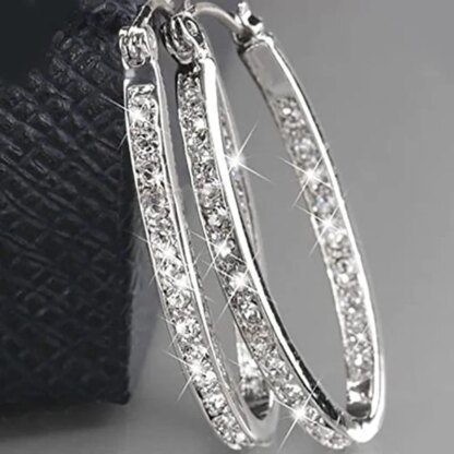 Shimmering Statement: Parisian Hoop Earrings from Fashion Week - Image 4