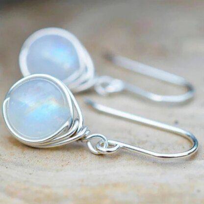 Shimmering Elegance: Silver-Plated Opal Earrings - Image 2