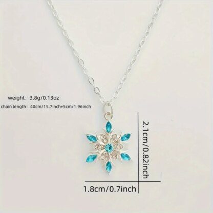 Enticing Snowflake Earrings: Shimmering Silver with Icy Blue Crystals - Image 5