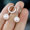 Shimmering Elegance: Pearl and Zircon Sterling Silver Earrings - Image 3