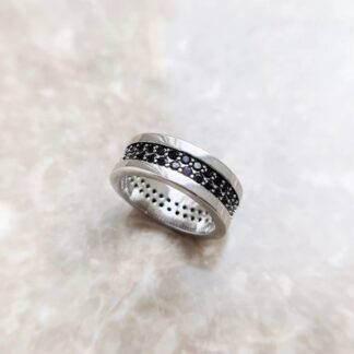 Exquisite Silver Band Adorned with Shimmering Black Stones