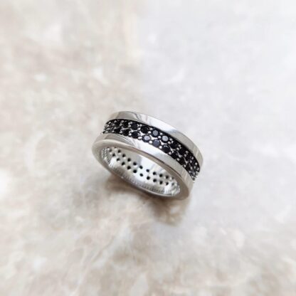 Exquisite Silver Band Adorned with Shimmering Black Stones