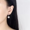 Shimmering Elegance: Pearl and Zircon Sterling Silver Earrings - Image 4